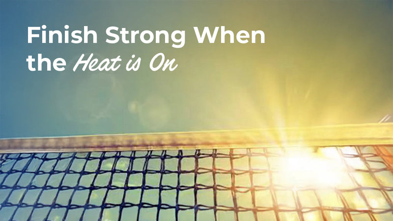 A close-up view of a tennis net with bright sunlight flaring through the mesh and the text "Finish Strong When the Heat is On," emphasizing endurance and proper hydration in high temperatures.